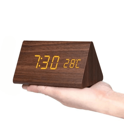 Digital alarm clock with LED display and thermometer