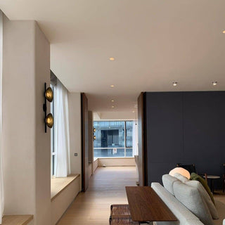 Two-arm round wall light for living room