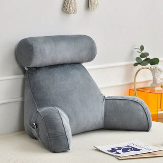 Orthopedic reading support pillow with armrests and pocket