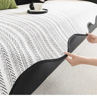 Pokrowiec na sofę dekoracyjny z jodełkowym wzorem i falistą krawędzią