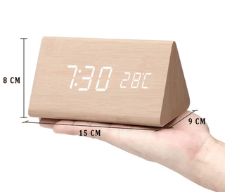 Digital alarm clock with LED display and thermometer