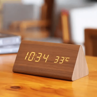 Digital alarm clock with LED display and thermometer