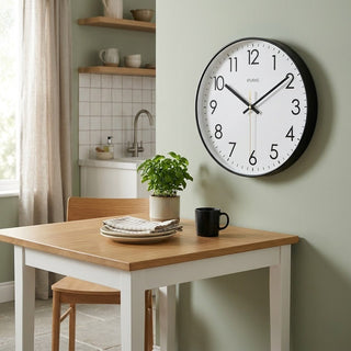 Round modern wall clock with silent movement for the living room