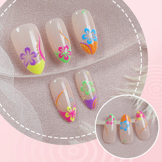 Colorful neon press-on nails with a floral pattern