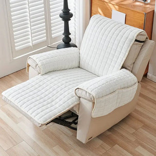 Quilted reversible armchair throw with side pockets