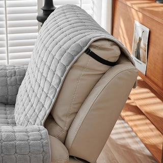 Quilted reversible armchair throw with side pockets