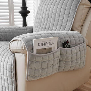 Quilted reversible armchair throw with side pockets
