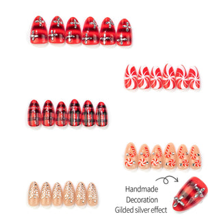 Press-on nails with rhinestones and Christmas designs